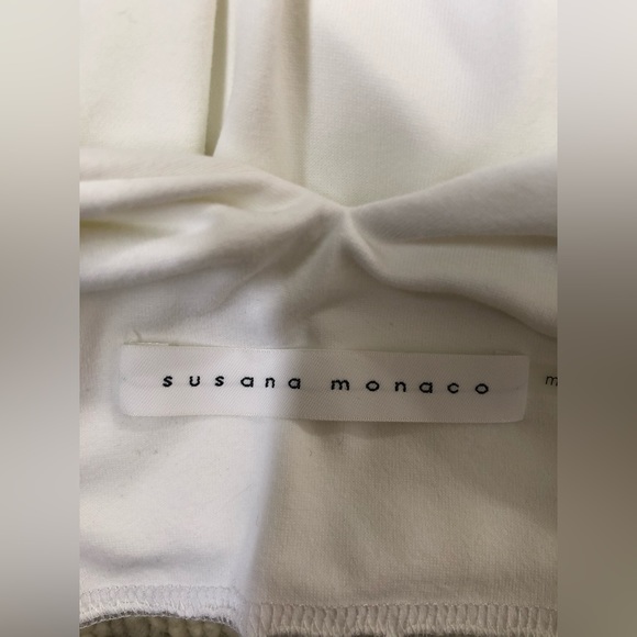 Mockneck white blouse with tie closure. - Picture 5 of 7